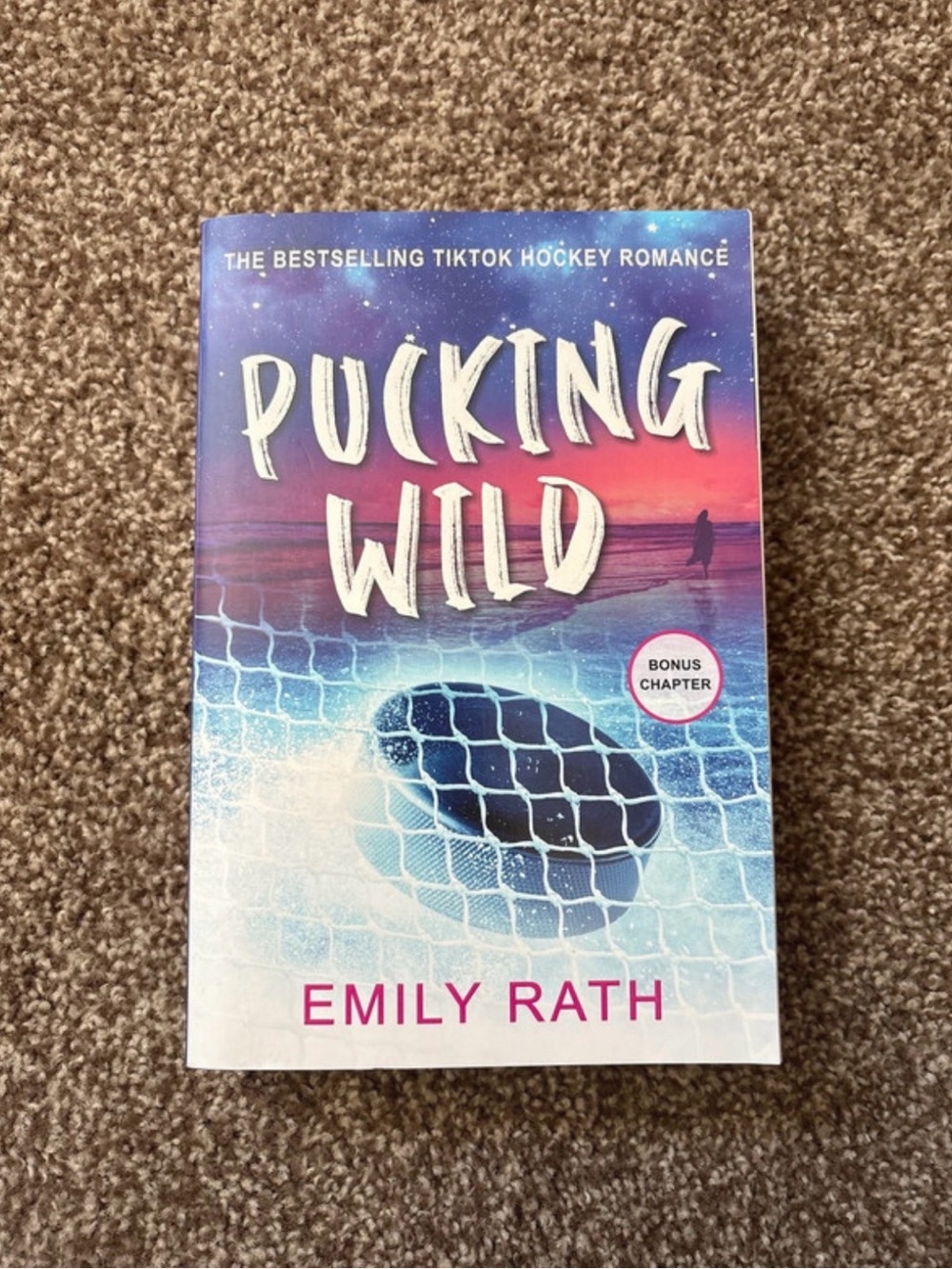 signed pucking wild by emily rath